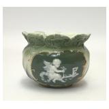 ANTIQUE GREEN CHERUB EMBOSSED PORCELAIN ROSE VASE