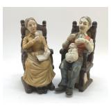 ELDER FIGURES IN ROCKING CHAIRS