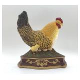 CAST-IRON HEN WITH CHICKS DOORSTOP
