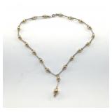 14 K YELLOW GOLD BALL IN STERLING NECKLACE