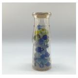VINTAGE MILK BOTTLE WITH MARBLES 7 INCHES