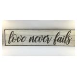 LOVE NEVER FAILS RUSTIC SIGN