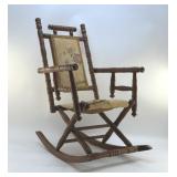 CHILDï¿½S ANTIQUE ROCKING CHAIR