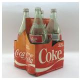 4 32OZ COKE BOTTLES