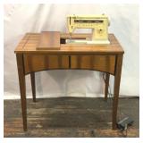 Vintage singer, sewing machine and cabinet
