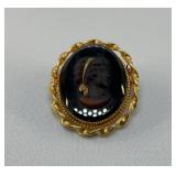 1960ï¿½s BLACK GLASS CAMEO BROOCH