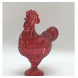 RUBY RED ROOSTER ON A NEST