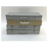(4) 15x8x2" metal storage Cases
