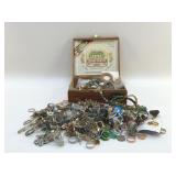 CIGAR BOX FULL OF COSTUME JEWELRY