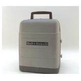 BELL AND HOWELL MOVIE PROJECTOR & LIGHT