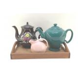 TEAPOTS, TRAY, AND A CREAMER