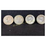 Four 40% silver Kennedy half dollars, various
