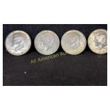 Four 40% silver Kennedy half dollars, various