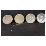 Four 40% silver Kennedy half dollars, various