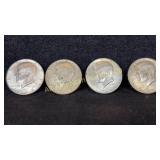 Four 40% silver Kennedy half dollars, various