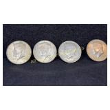 Four 40% silver Kennedy half dollars, various