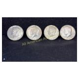 Four 40% silver Kennedy half dollars, various