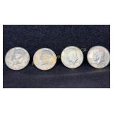 Four 40% silver Kennedy half dollars, various