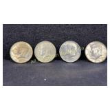 Four 40% silver Kennedy half dollars, various