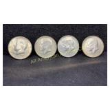 Four 40% silver Kennedy half dollars, various