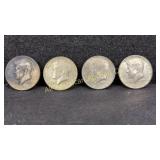 Four 40% silver Kennedy half dollars, various