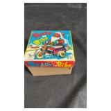 Santa On Bike celluloid & metal wind up toy