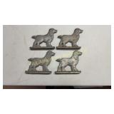 Four cast aluminum "Dog" gate toppers for