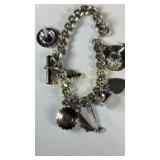 Sterling charm bracelet with 9 sterling charms