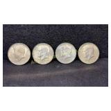 Four 40% silver Kennedy half dollars, various