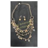 Necklace and earring set marked "T"