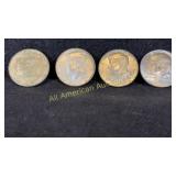 Four 40% silver Kennedy half dollars, various