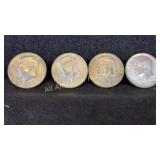 Four 40% silver Kennedy half dollars, various