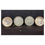 Four 40% silver Kennedy half dollars, various