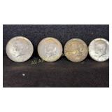 Four 40% silver Kennedy half dollars, various