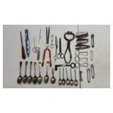 Mixed lot of old spoons, letter openers, keys, etc