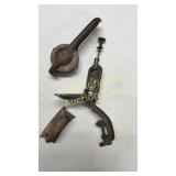 Three vintage tools, cement trowel, juicer, pitter