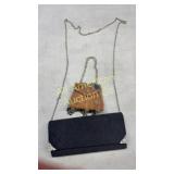 Two purses, one old one and one new one