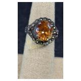 Sterling ring with topaz stone, marked '925 & MO'