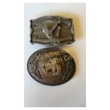 Two brass belt buckles. Bicentennial &  a bronc