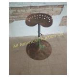 ANTIQUE TRACTOR SREAT ON METAL STAND