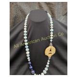 HESPERA HONEY JADE CARVED DOUBLE FISH NECKLACE