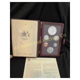 1984 OLYMPIC PRESTIGE COIN SET IN LEATHER CASE