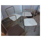 4 Folding Chairs (1 dark seat, 1 seat with rip...
