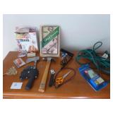 Axe, Hammer, Extension Cord, Stud Finder, Brackets