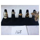 5 Costume Rings (black holder not included)