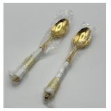 (2) TBCL Japan gold-finished teaspoon featuring a