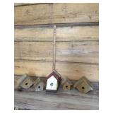 Assortment of bird houses and frames