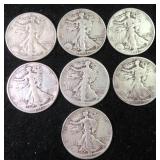 Seven (7) Silver Walking Liberty Half Dollars, $86