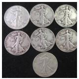 Seven (7) Silver Walking Liberty Half Dollars, $86