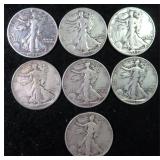 Seven (7) Silver Walking Liberty Half Dollars, $86